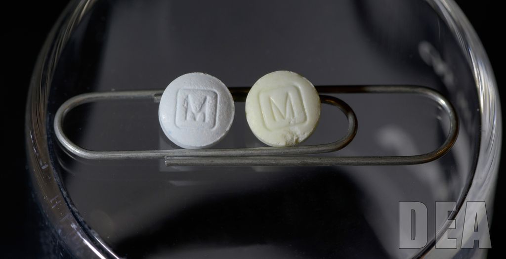 Two pills side by side - one fentanyl and one legitimate prescription drug - can't tell the difference.