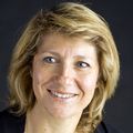 Ruth Etzioni, Ph.D., a person with blond hair, smiling.