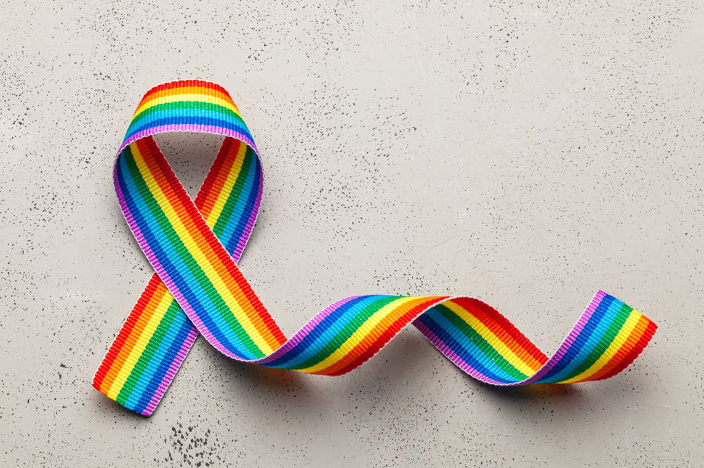 Transgender and gender-expressive communities multicolor ribbon of support.