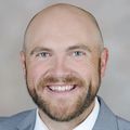 Stephen Donnelly, M.D. (OHSU) with gray background.