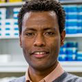 Fikadu Tafesse standing in his lab.
