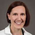 Mary Tanski, M.D., M.B.A. (OHSU) against a brown background.