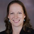Jacqueline Brady, M.D. next to a gray background.