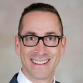 Darren Malinoski, M.D., next to a gray background.