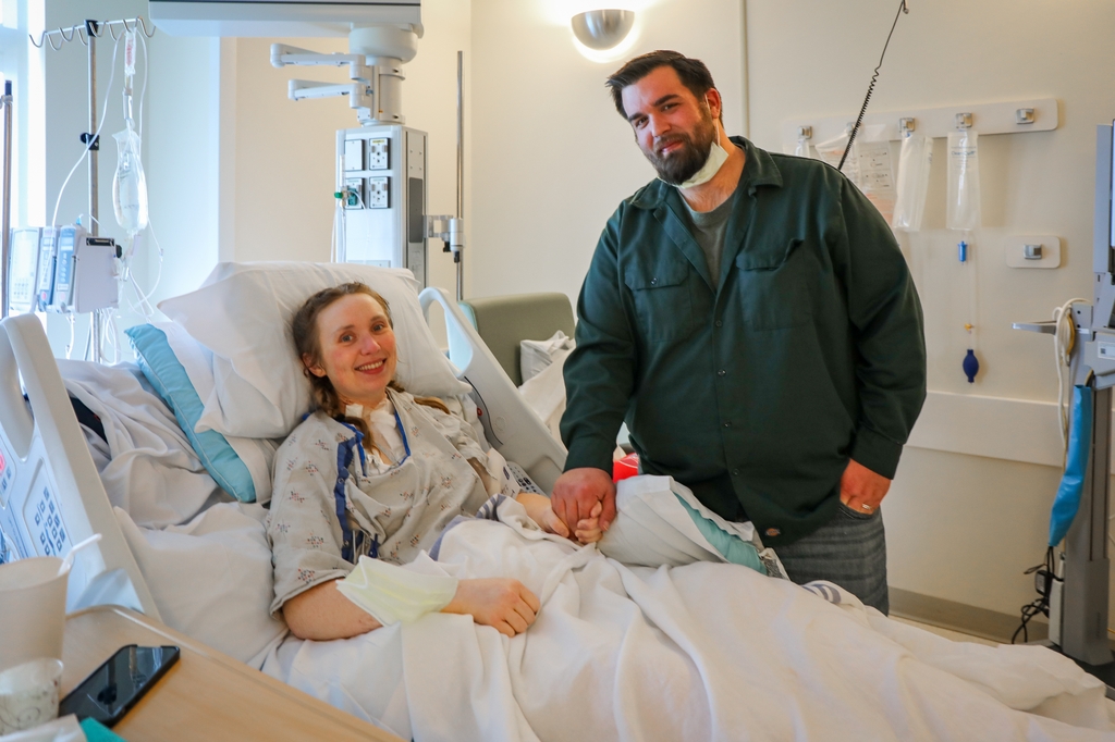Jessica Warren, 31, center, was 25 weeks pregnant when imaging showed she had an aortic dissection, or a tear in the aorta artery at the top of the heart, and she was transported from Salem via Life Flight to OHSU for care. Here with her husband, Erick Warren, 36.&nbsp;(OHSU/Christine Torres Hicks)