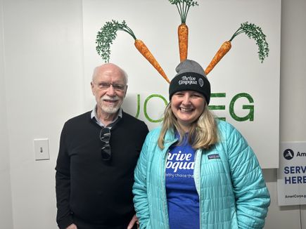 Jessica Hand, M.P.H., executive director of Thrive Umpqua, right, smiles with OHSU Moore Institute Director Emeritus Kent Thornburg, Ph.D., during a May 2023 event to officially launch Douglas County as a regional hub of the Nutrition Oregon Campaign. The statewide campaign seeks to end chronic disease through healthy food and science. (OHSU)