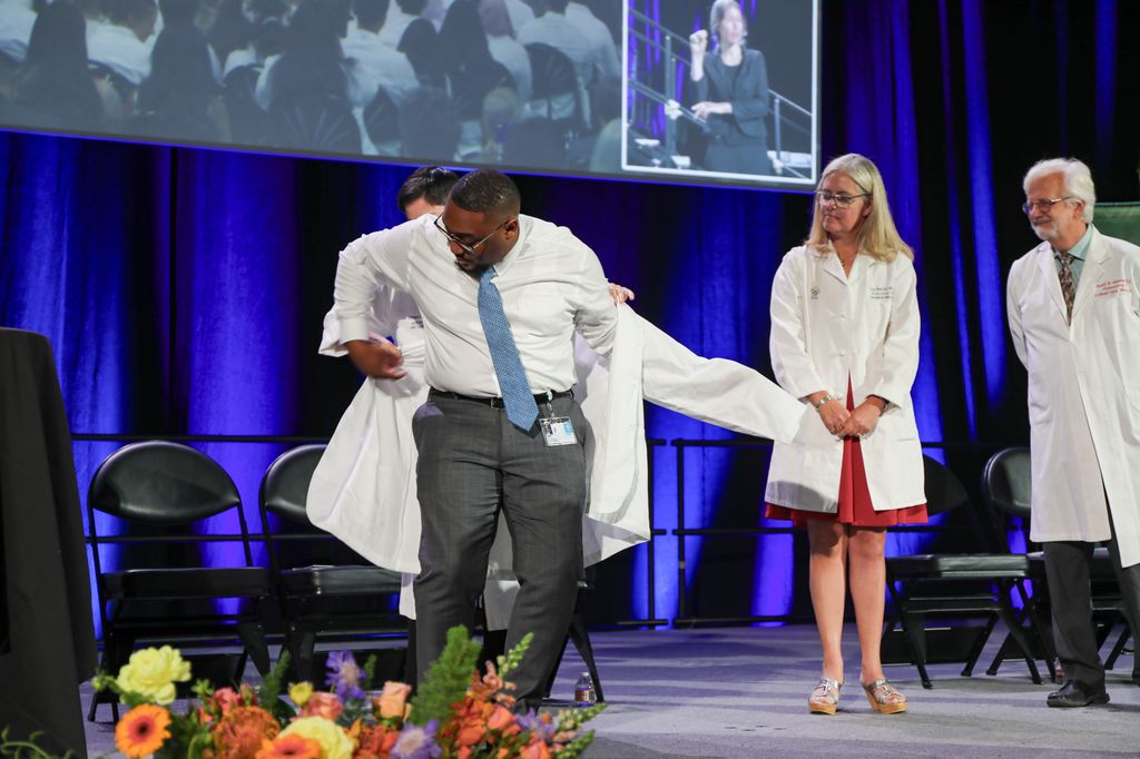 OHSU School of Medicine White Coat 2027. Oregon Health & Science University’s newest medical students attend a time-honored ceremony that has them symbolically slip on their white coats for the first time. These students are on the path to graduate in 2027. (OHSU/Christine Torres Hicks)