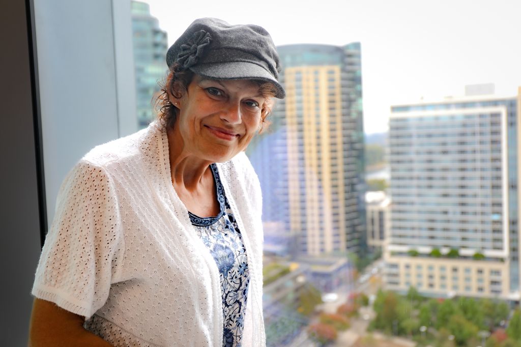 Rhonda Stranz, 51, of Kelso, Washington, at a recent appointment at the OHSU Center for Health & Healing Building 2 in Portland. Stranz has benefited from an early-phase clinical trial at OHSU. (OHSU/Christine Torres Hicks)