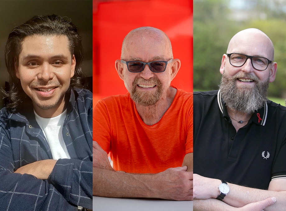 Adam Castillejo (cabello largo y rizado oscuro, camiseta blanca), Paul Edmonds (camiseta naranja, vello facial y gafas de sol oscuras, sin pelo) y Marc Franke (sin pelo, gafas, vello facial, camiseta oscura), de izquierda a derecha.