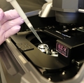 Researcher prepares imaging equipment in OHSU oral microbiome laboratory