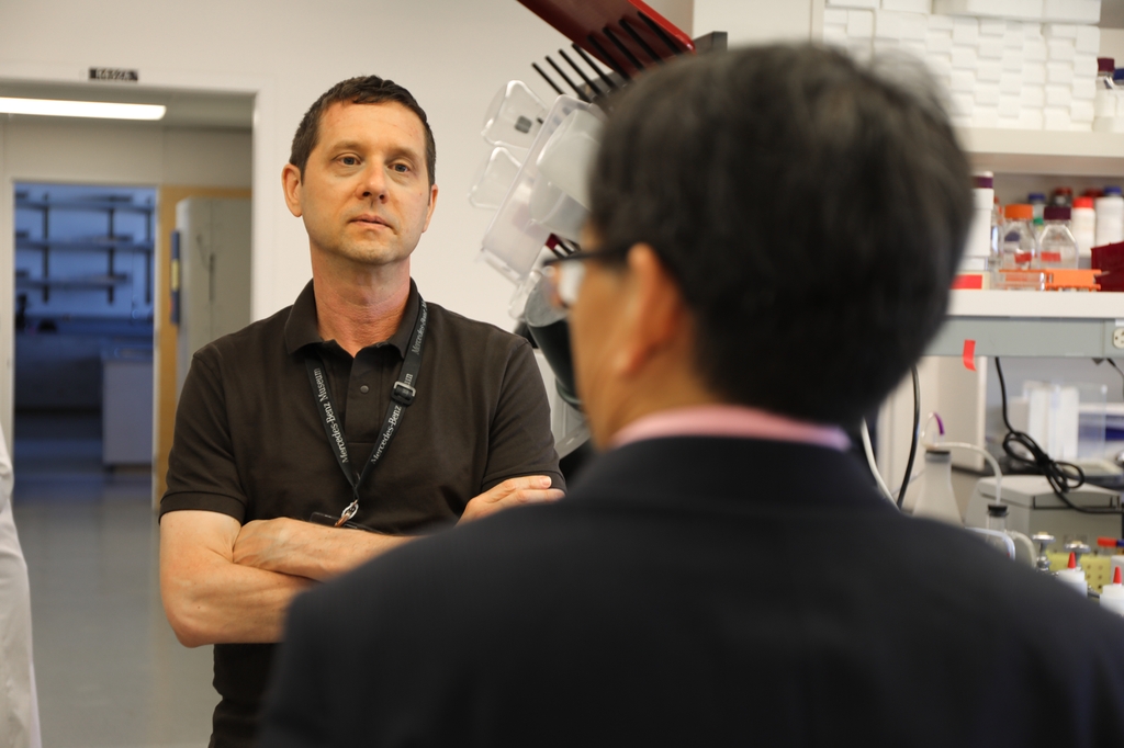 Justin Merritt and Hui Wu in lab