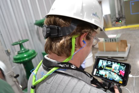 Brunswick Nuclear Plant employee, William Kerr, training to fly indoor drones. 