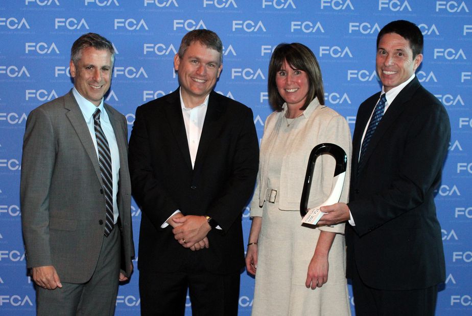Xerox Accepting Services Quality Supplier Award from FCA US