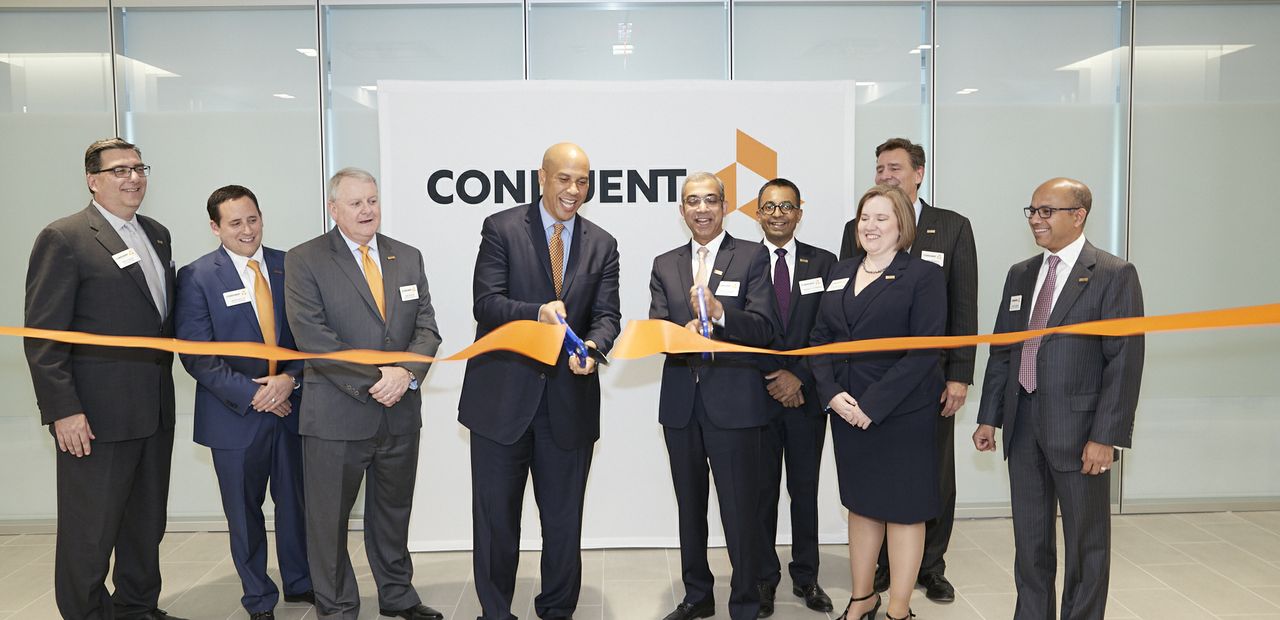 U.S. Senator Cory Booker with Conduent senior leadership team