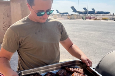 deployed troop grilling