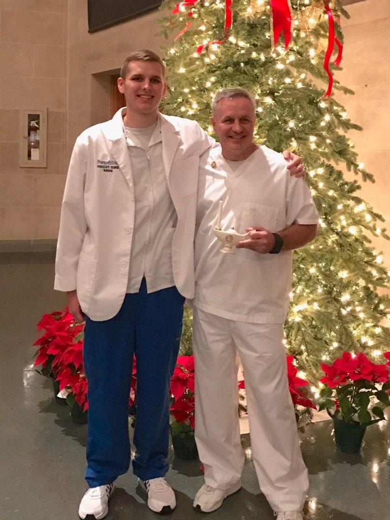 Larry Rehrig celebrates graduation with his son Logan