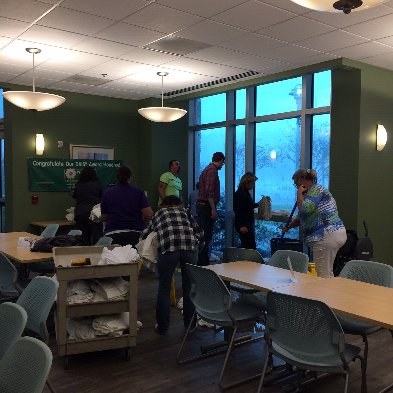 Team members get supplies ready