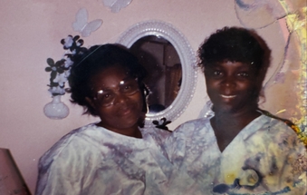 Joyce McNeill with her mother Ornetha take a picture together after church wearing the same dress
