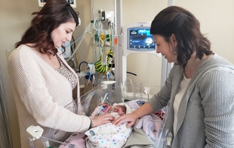 Taylor and her mother Tricia Bullins visit Norah at the hospital