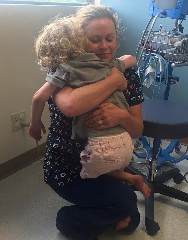 Shea hugs Emily Weaver