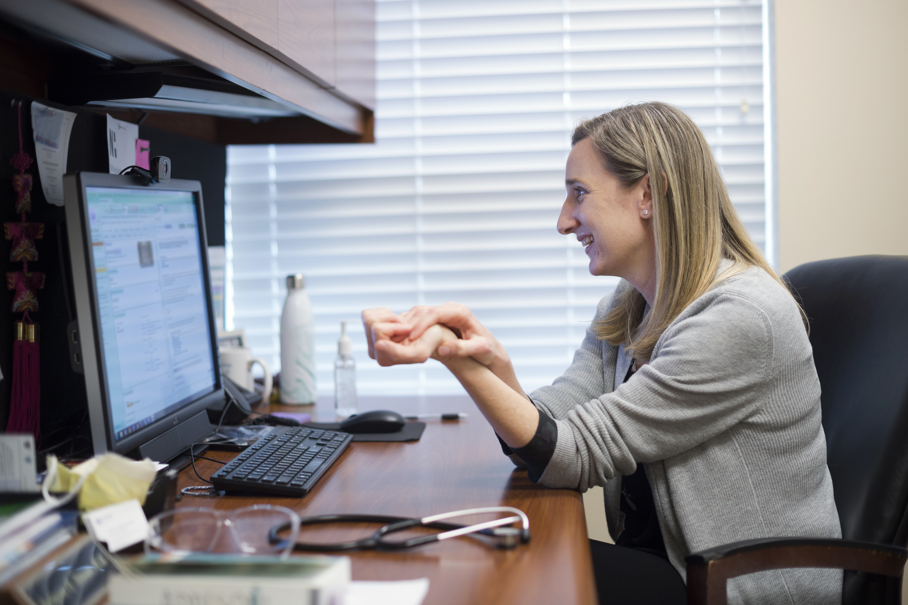 Dr. Katherine Addison talks with a Charlotte family via virtual visit.