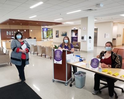 Left to right - Jamie Vogler Akemi Raish and Sidney Yates staff the guest services table at Novant Health Clemmons Medical Center