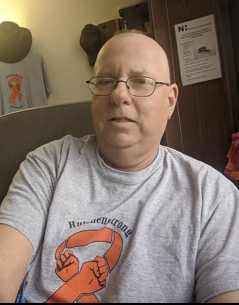 Jeffrey Hutchens, a patient of Dugan's, relaxes at home. 