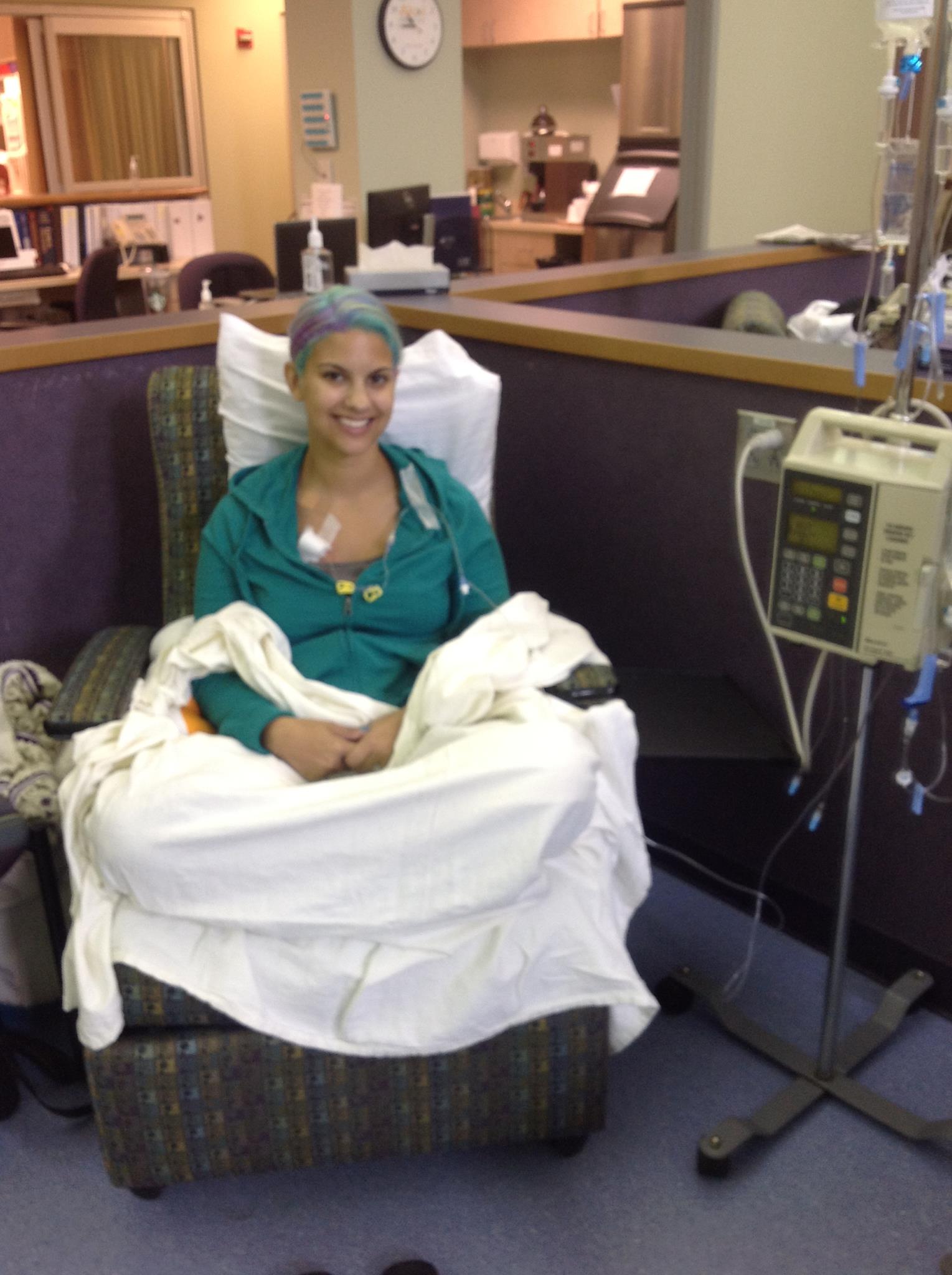 Novant Health cancer patient, Katie Warren, dyed her hair teal in honor of ovarian cancer.