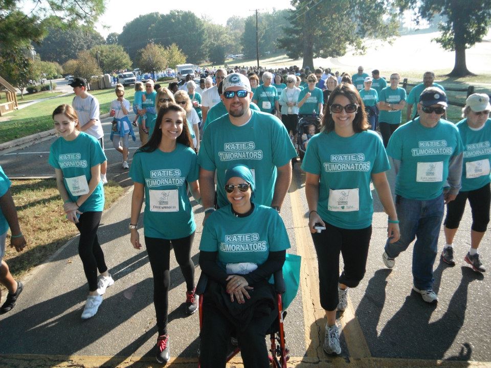 Katie Warren is pictured with supportive family and friends at a previous Athena's Run for GYN Cancers.