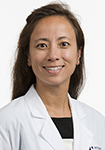 Dr. Elizabeth Skinner in a white coat
