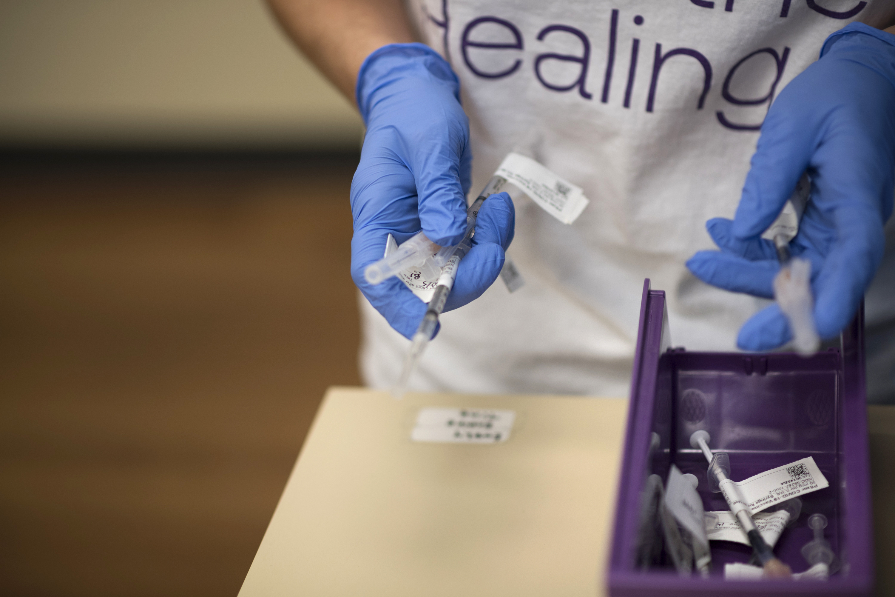 COVID vaccine needle