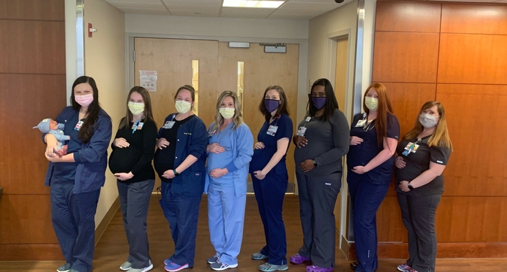 9 team members pregnant at same time? They’re officially COVID moms.