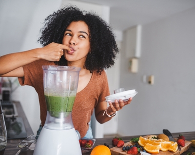 Black woman cooking healthy dietitian food bariatric solutions