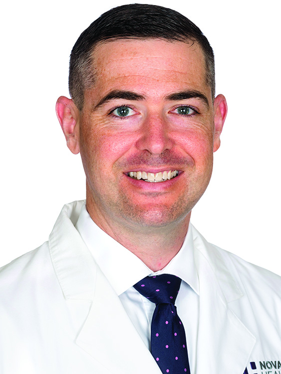 Dr. Hadley Wilson smiles for a photo.