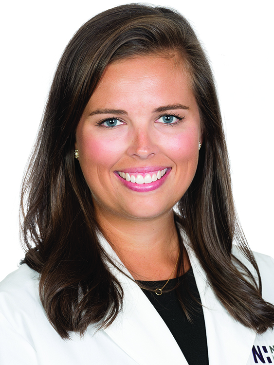 Hannah Palmer, a nurse practitioner, smiles for a photo.