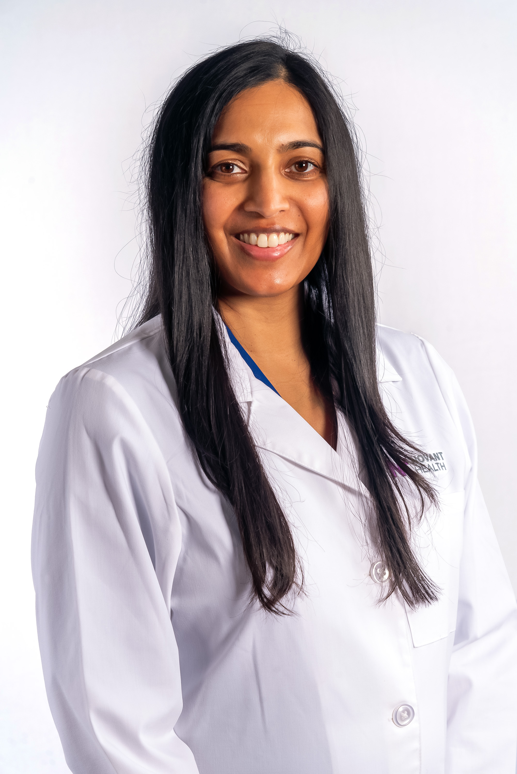 Dr. Meena Rao white coat
