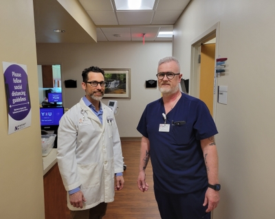 Dr. O_Toole and Dr. Moore in hallway no mask