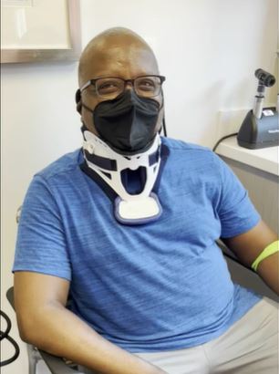 Tim Cooper, a Black man, smiles for a photo in Charlotte, North Carolina.