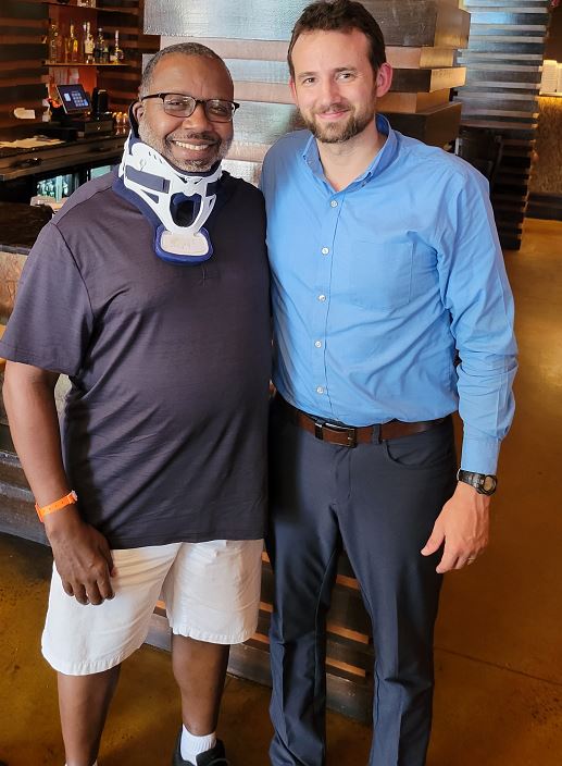 josh and tim pose for a photo after having lunch in north carolina.