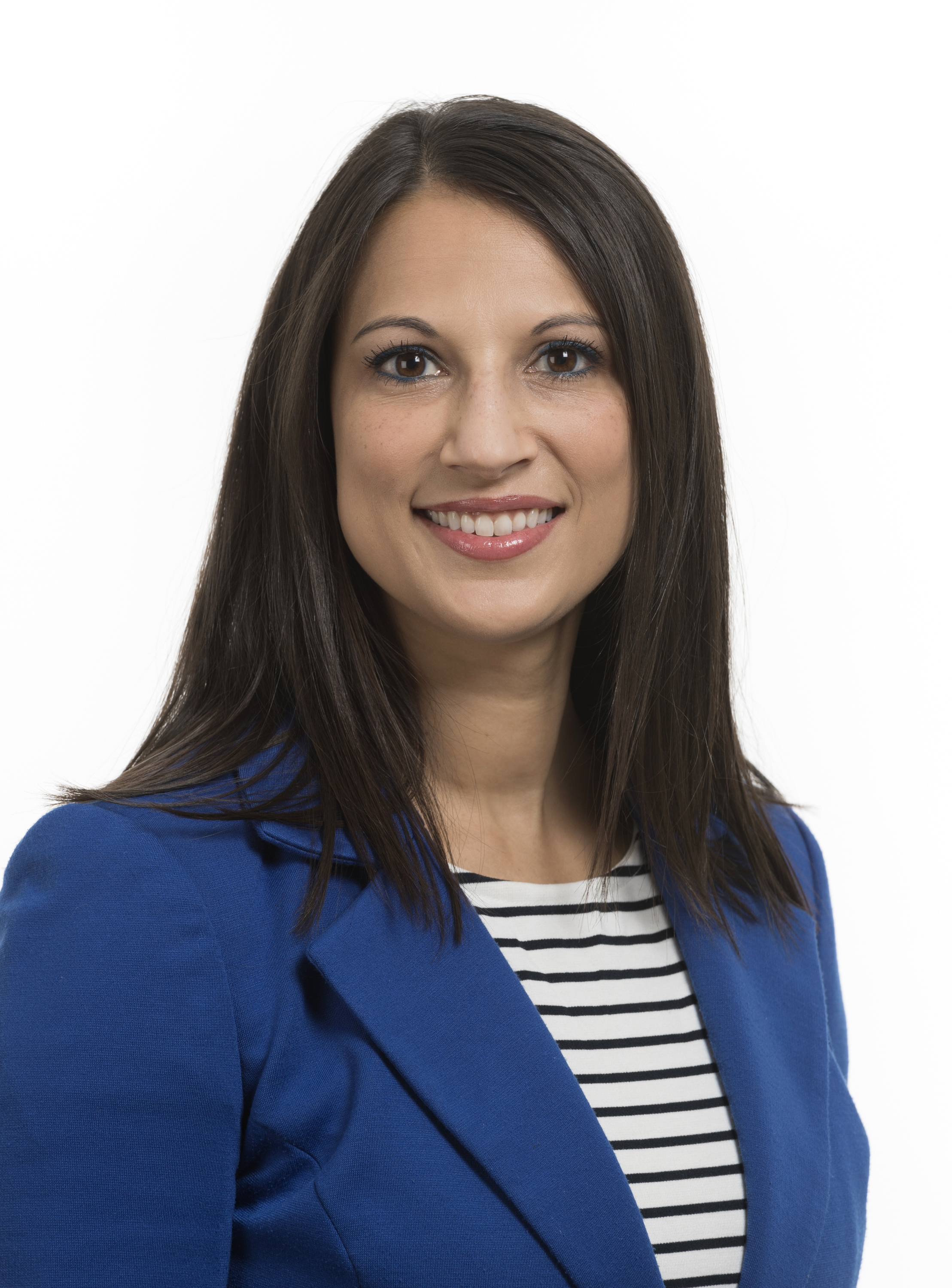 Gina Fambrough, a woman with dark brown hair in a blue coat.
