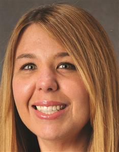 Laurie Whalin, president of the future Scotts Hill Medical Center, smiles at the camera