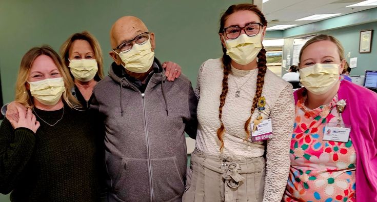 Michael Shore and daughter Angel. his sister and two team members