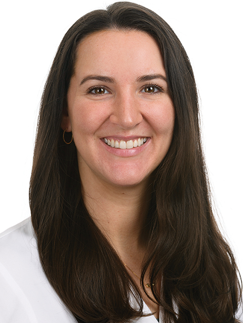 Dr. Rebecca Lane wears a white coat and smiles. 