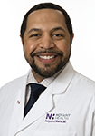 Dr. Benjamin Missick wears a white coat and smiles.