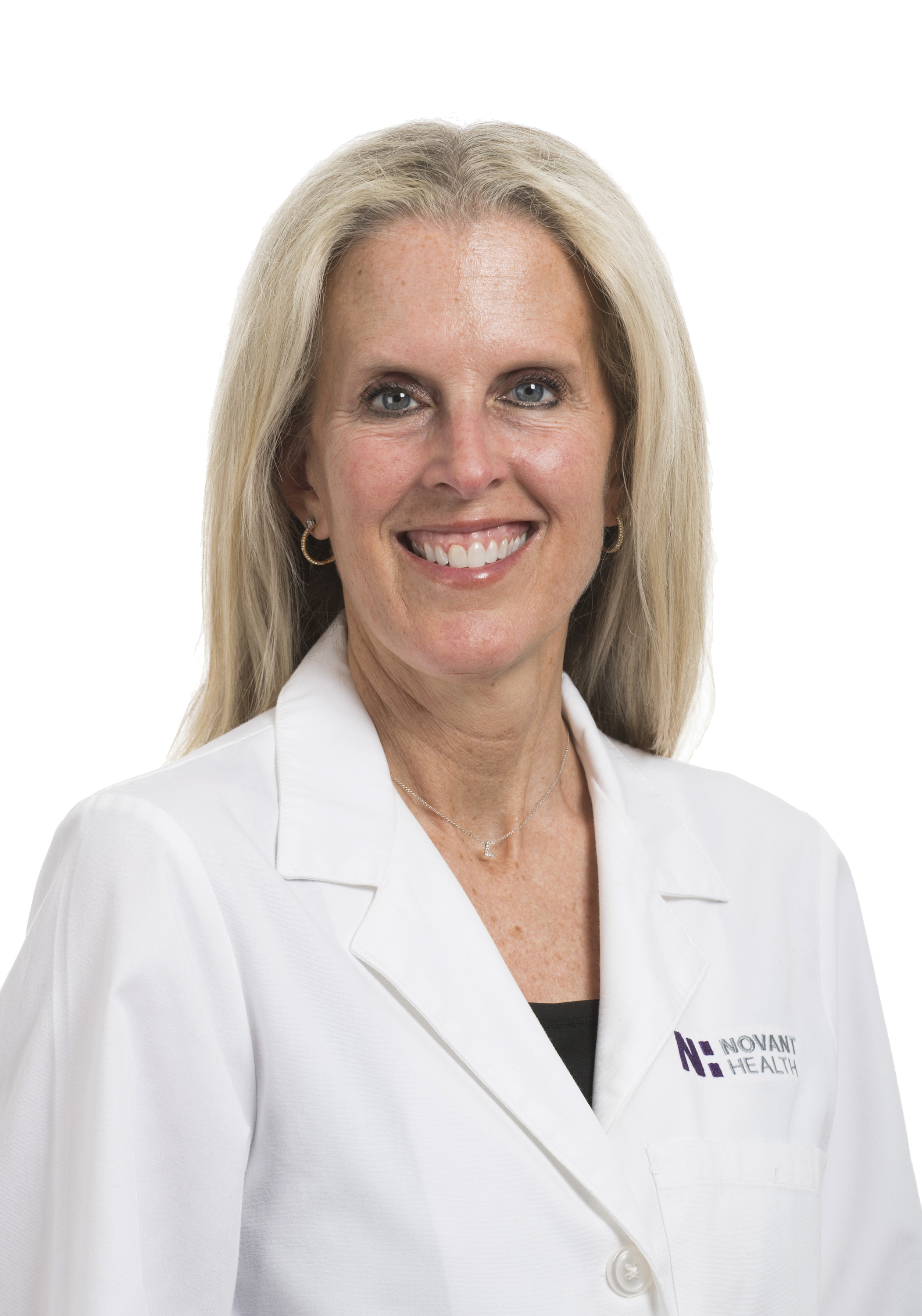 Dr. Lisa Cannada wears a white coat and smiles.