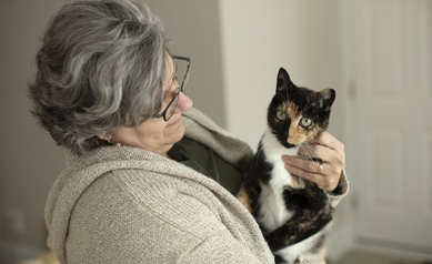 Paula Vertino holds her cat, Abigail. 