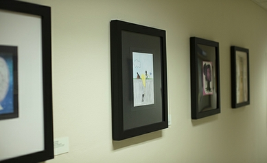 Artwork by patients and community members lines the department’s Bridge Art Gallery walls. 