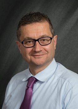 a portrait of Dr. Carlo Ercoli