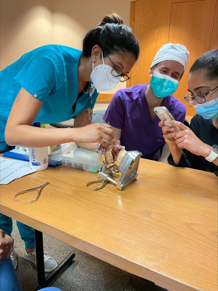 Faculty teaching a resident 