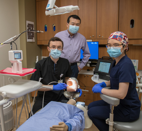 Dr. Ren mentors EIOH residents during research